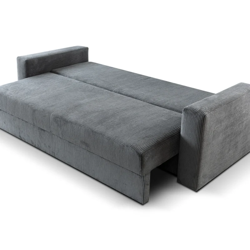 Jasna rozłożona sztruksowa sofa Abi 4 z funkcją spania i otwartym pojemnikiem na pościel.